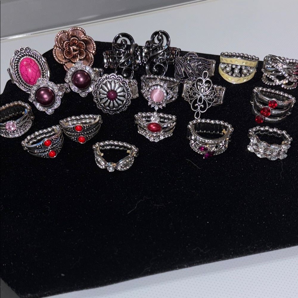 22 beautiful paparazzi rings. Stretchy bands. One size fits most.